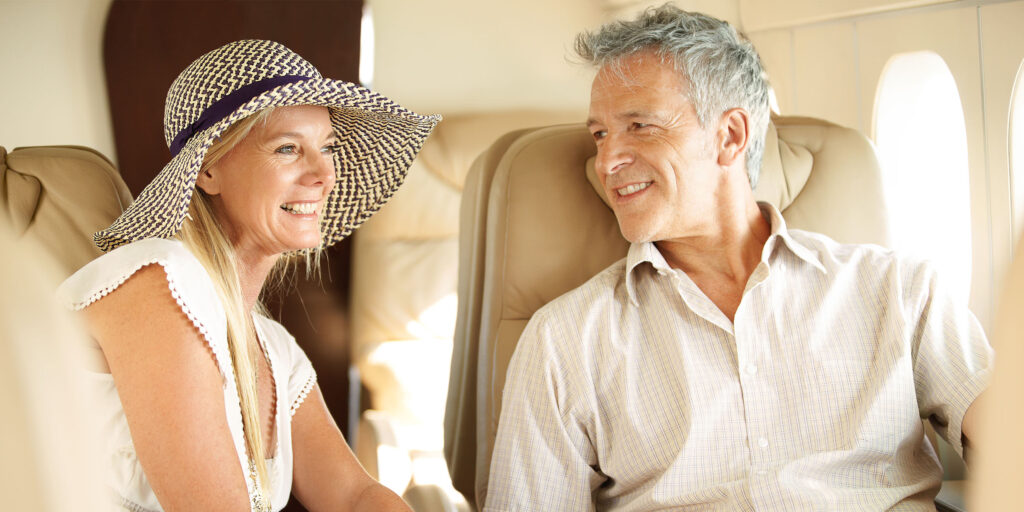 Man and Woman smiling in jet | JAI Aviation